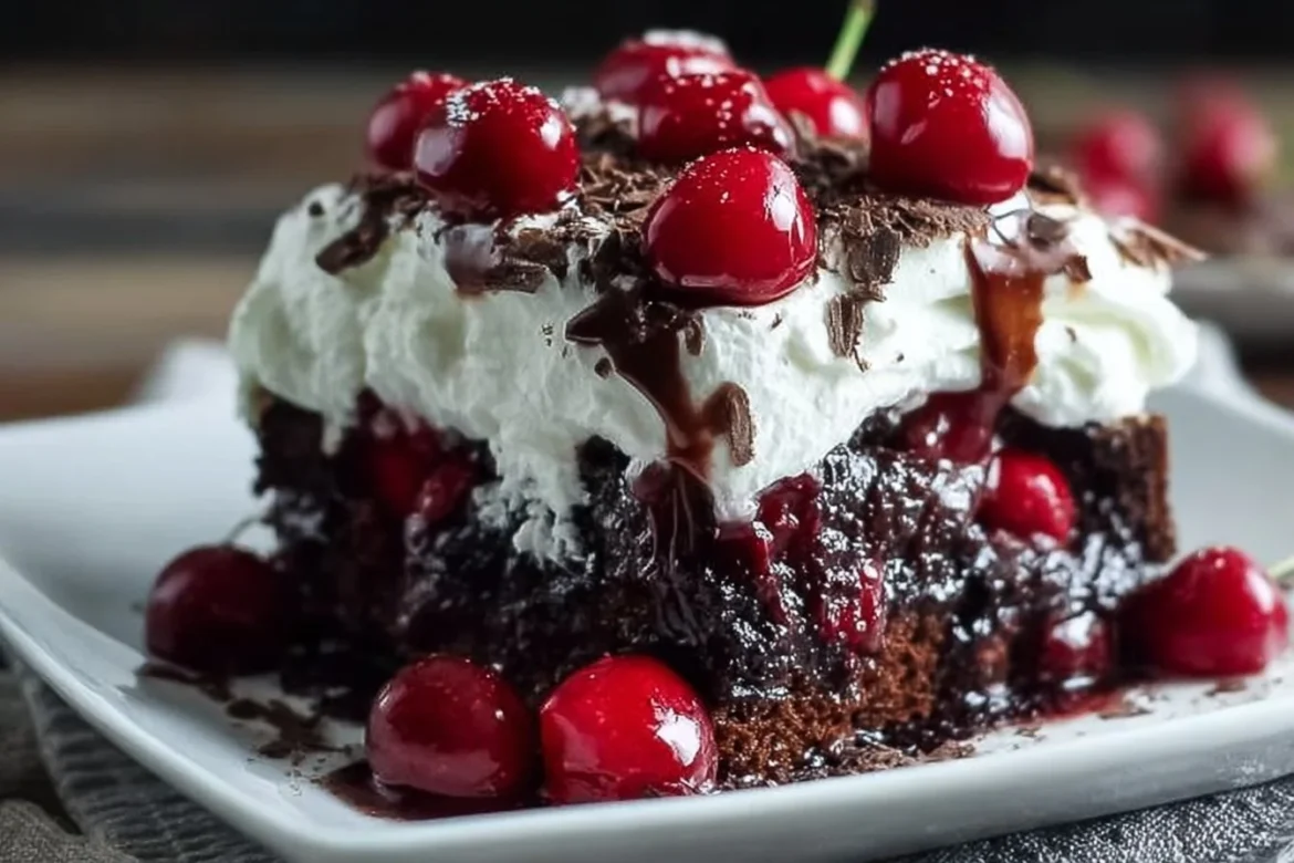 Delicious Black Forest Poke Cake with chocolate sponge and cherry topping