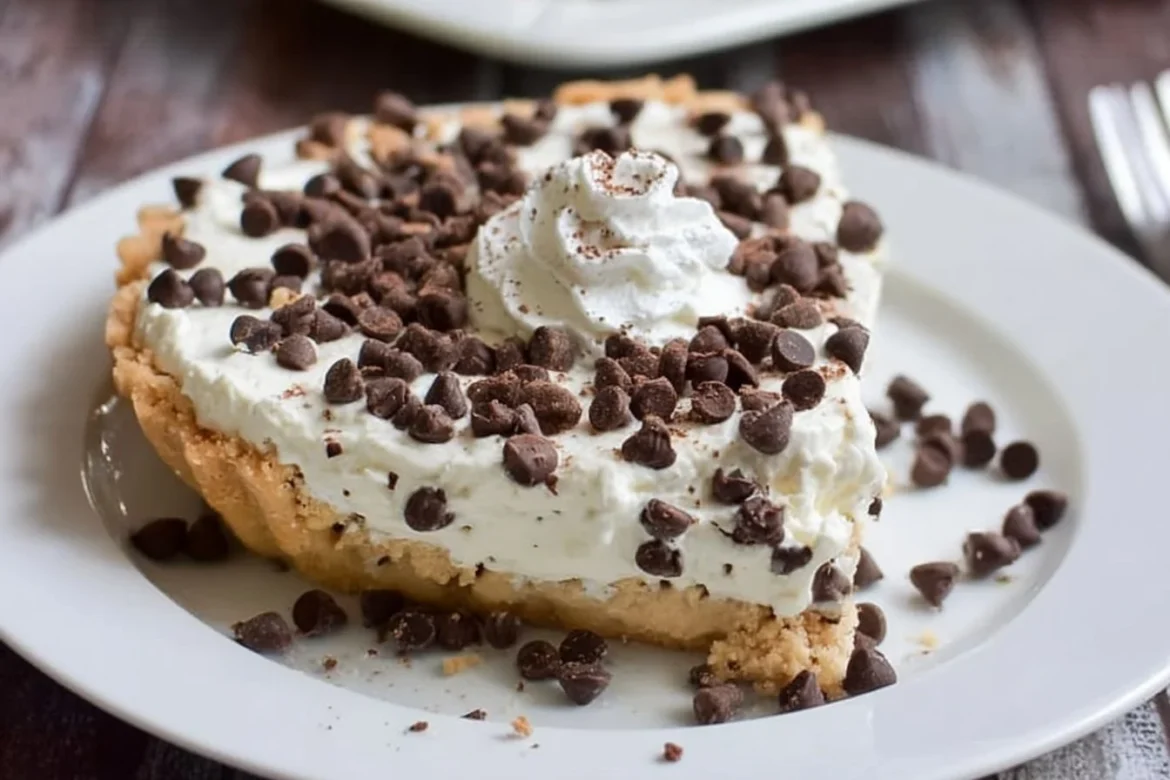 Delicious Chocolate Chip Cannoli Pie served on a plate with a fork
