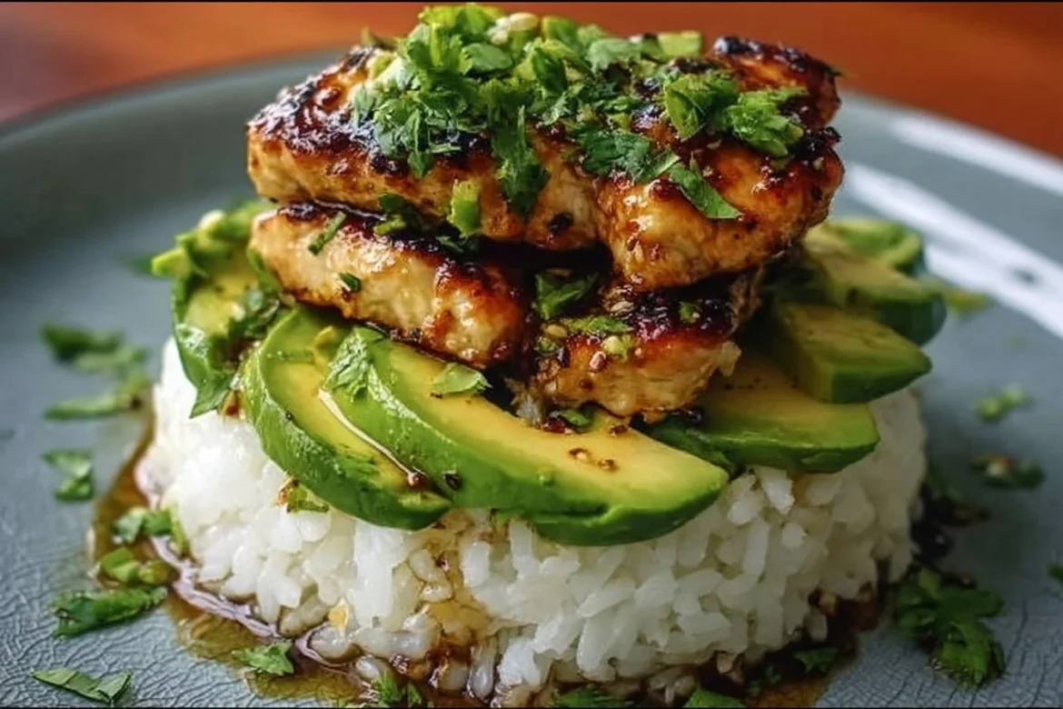 Delicious honey lime chicken served with avocado rice in a stacked presentation