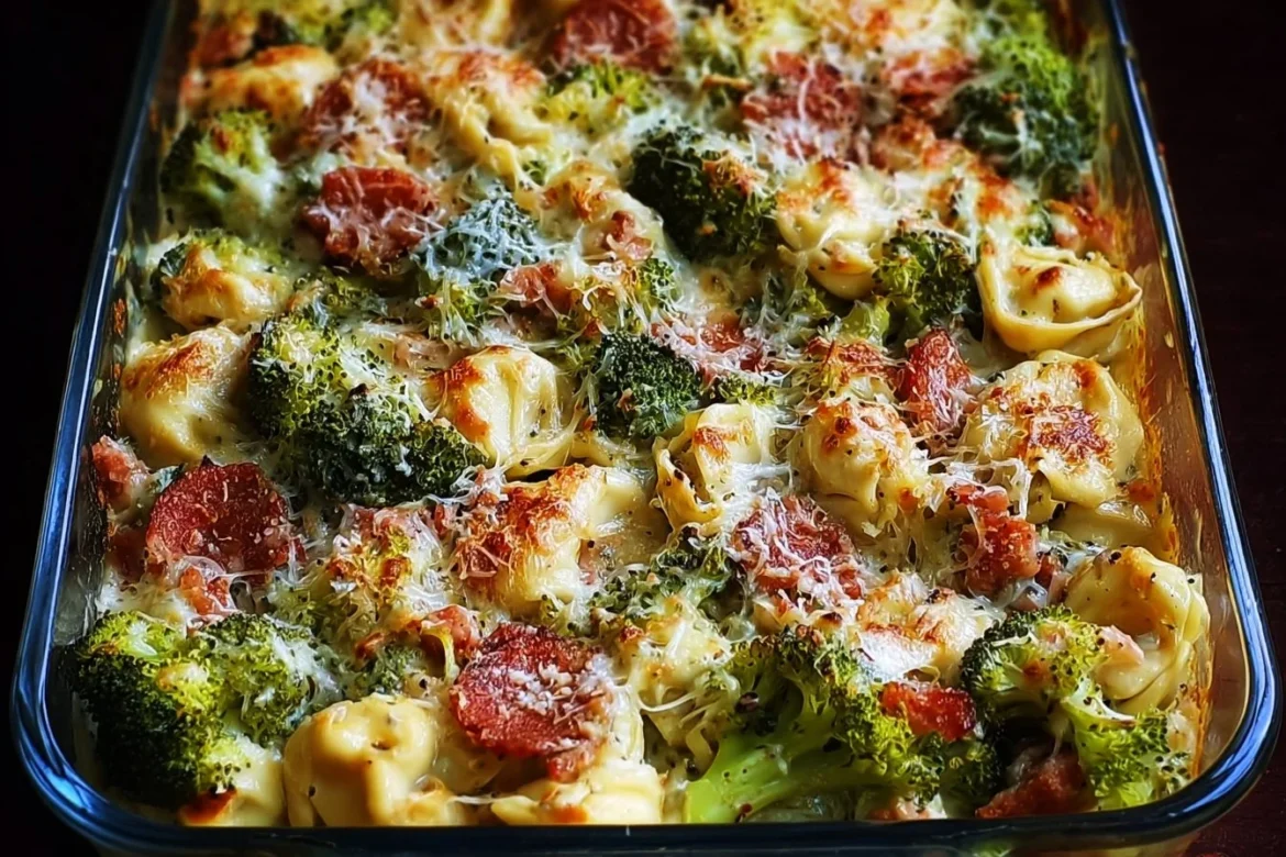 Sheet Pan Broccoli Tortellini Bake with cheese and veggies on a baking tray