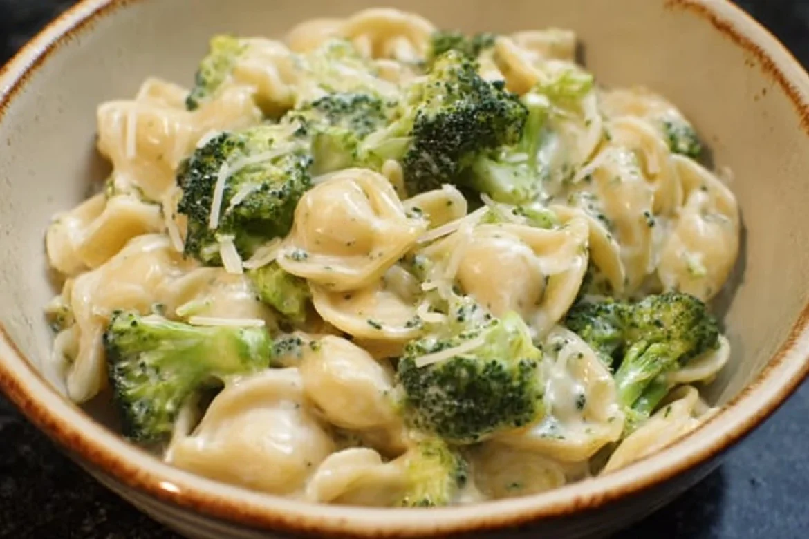 Creamy broccoli pasta dish with vibrant green broccoli and pasta noodles
