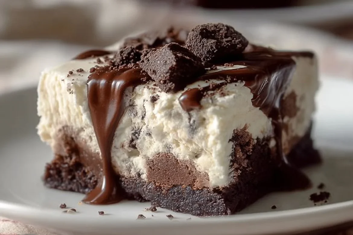 Frozen brownie ice cream cake with chocolate topping and whipped cream