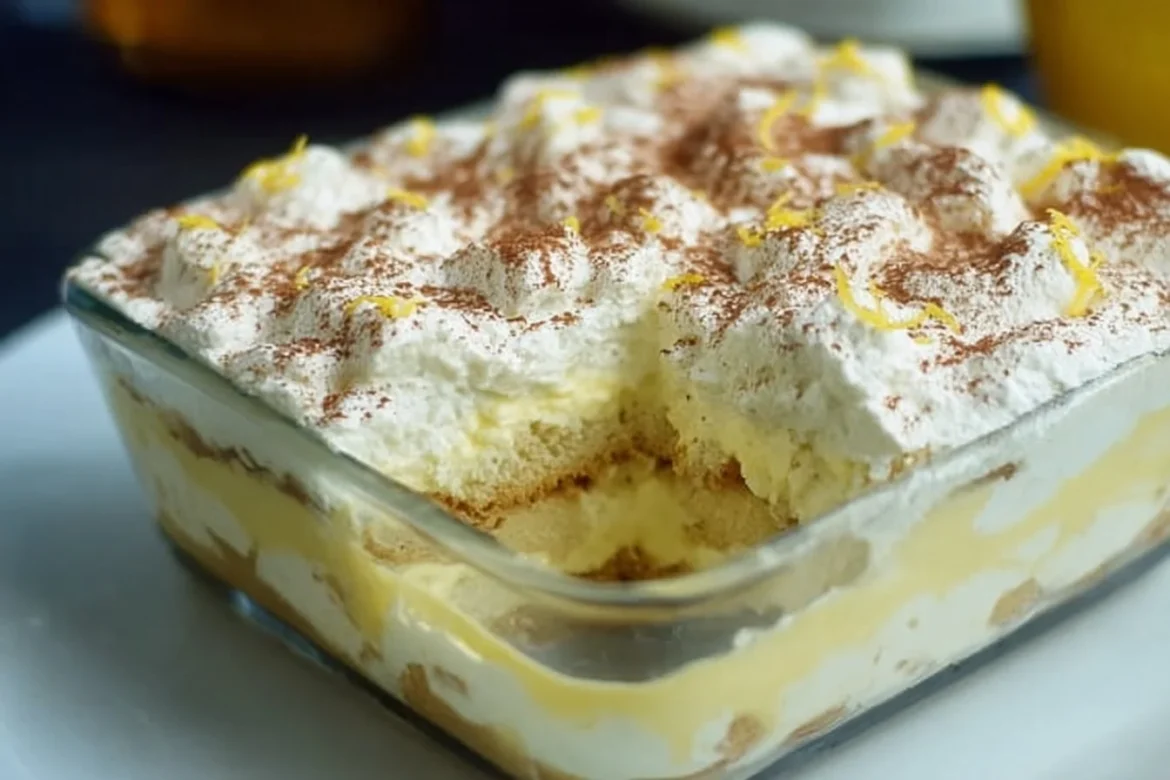 Delicious Limoncello Tiramisu topped with zest and cocoa powder.