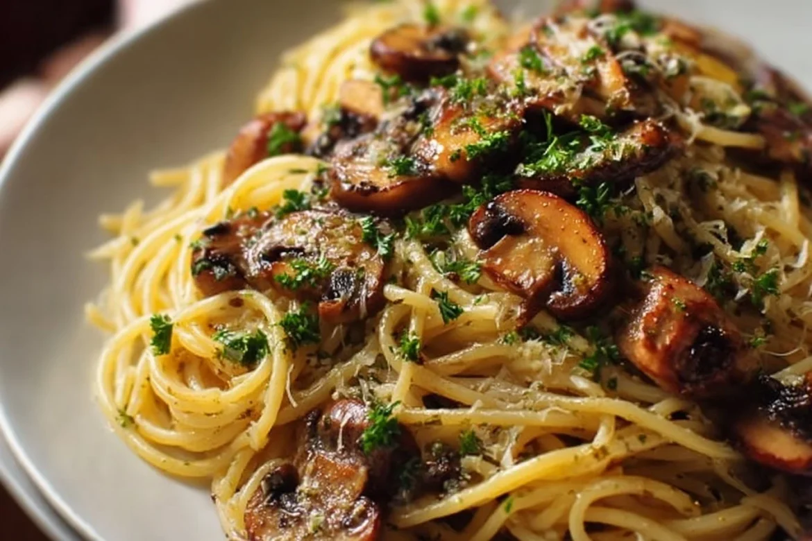 Delicious mushroom pasta with garlic oil served in a beautiful bowl
