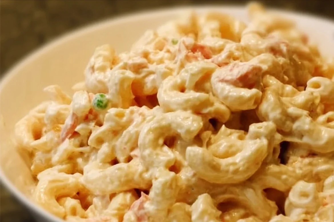 Ono Hawaiian BBQ macaroni salad served in a bowl with fresh ingredients.