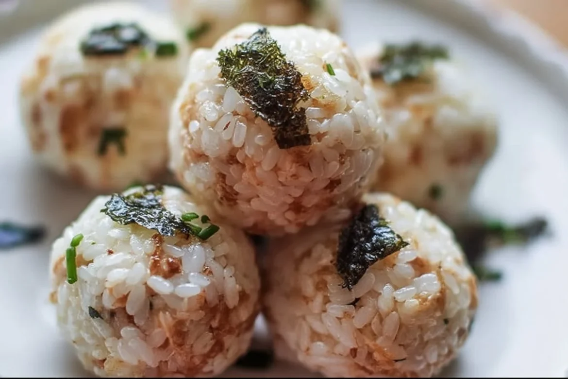 Deliciously made tuna rice balls served on a plate, perfect for snacks.