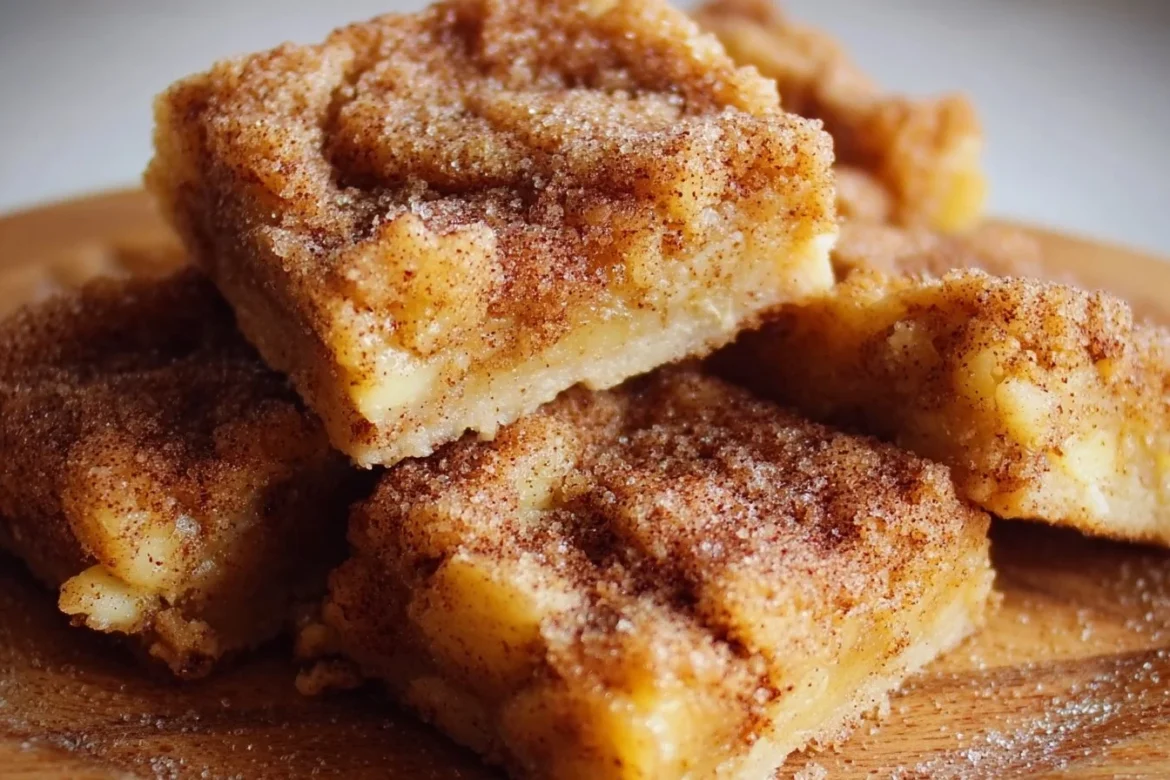 Delicious Apple Snickerdoodle Bars with a cinnamon topping and apple filling