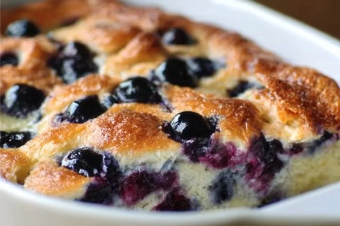Blueberry buttermilk pancake casserole baked golden brown in a dish