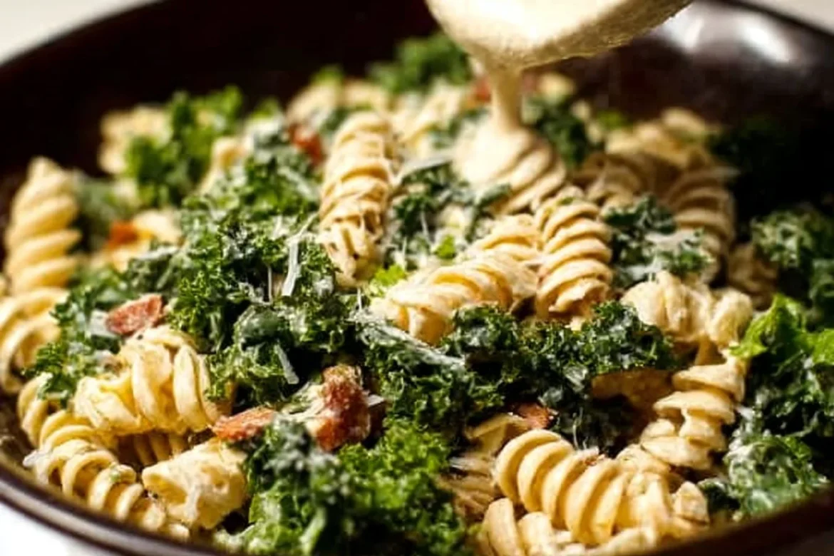 Kale Caesar Pasta Salad with fresh ingredients and dressing