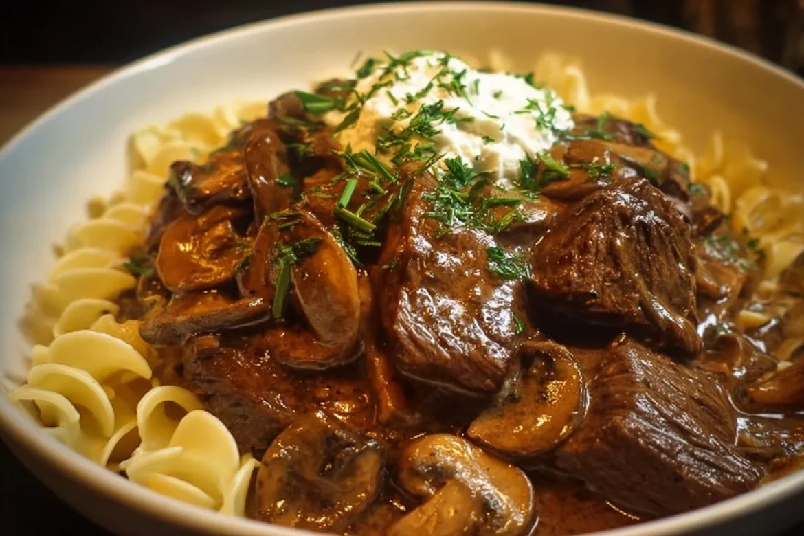 Slow cooker pot roast beef stroganoff with creamy sauce and tender meat