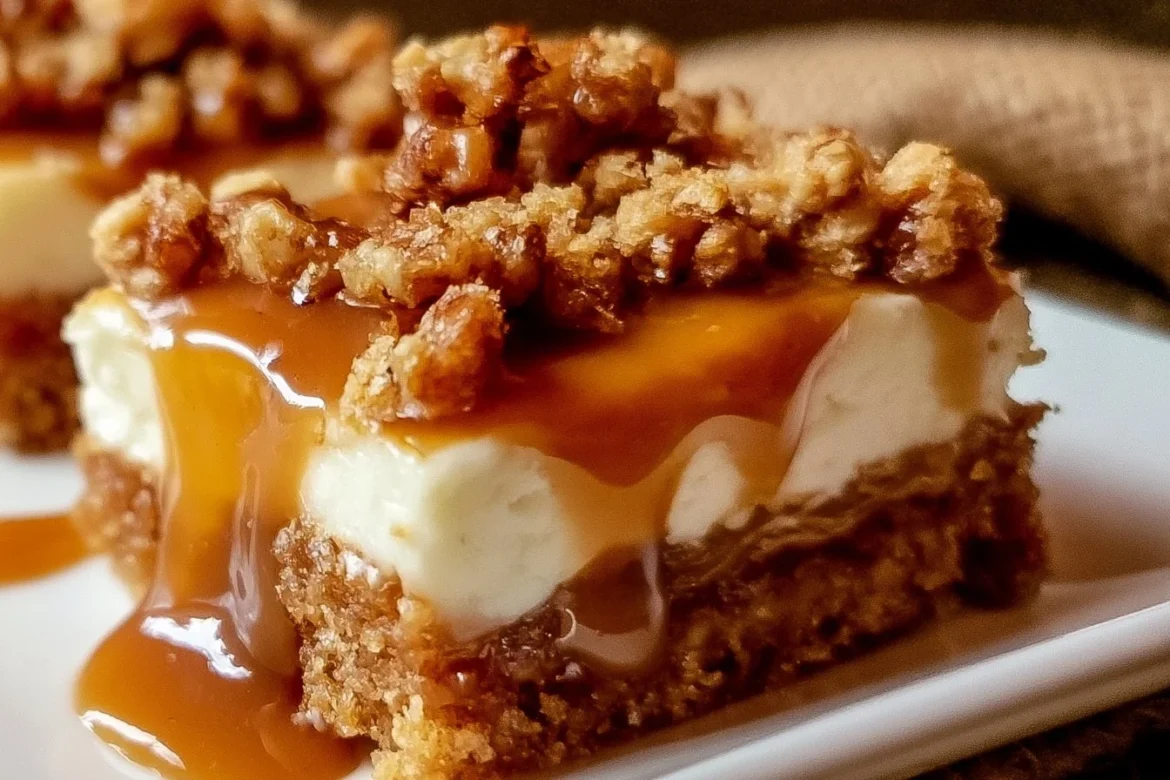 Delicious Caramel Apple Cheesecake Bars topped with caramel and apples