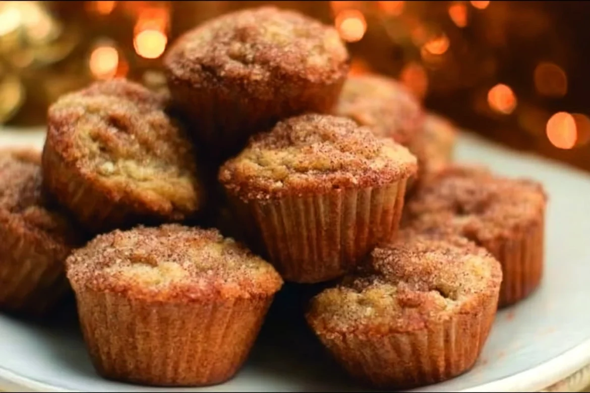 Freshly baked cinnamon banana mini muffins in a baking tray
