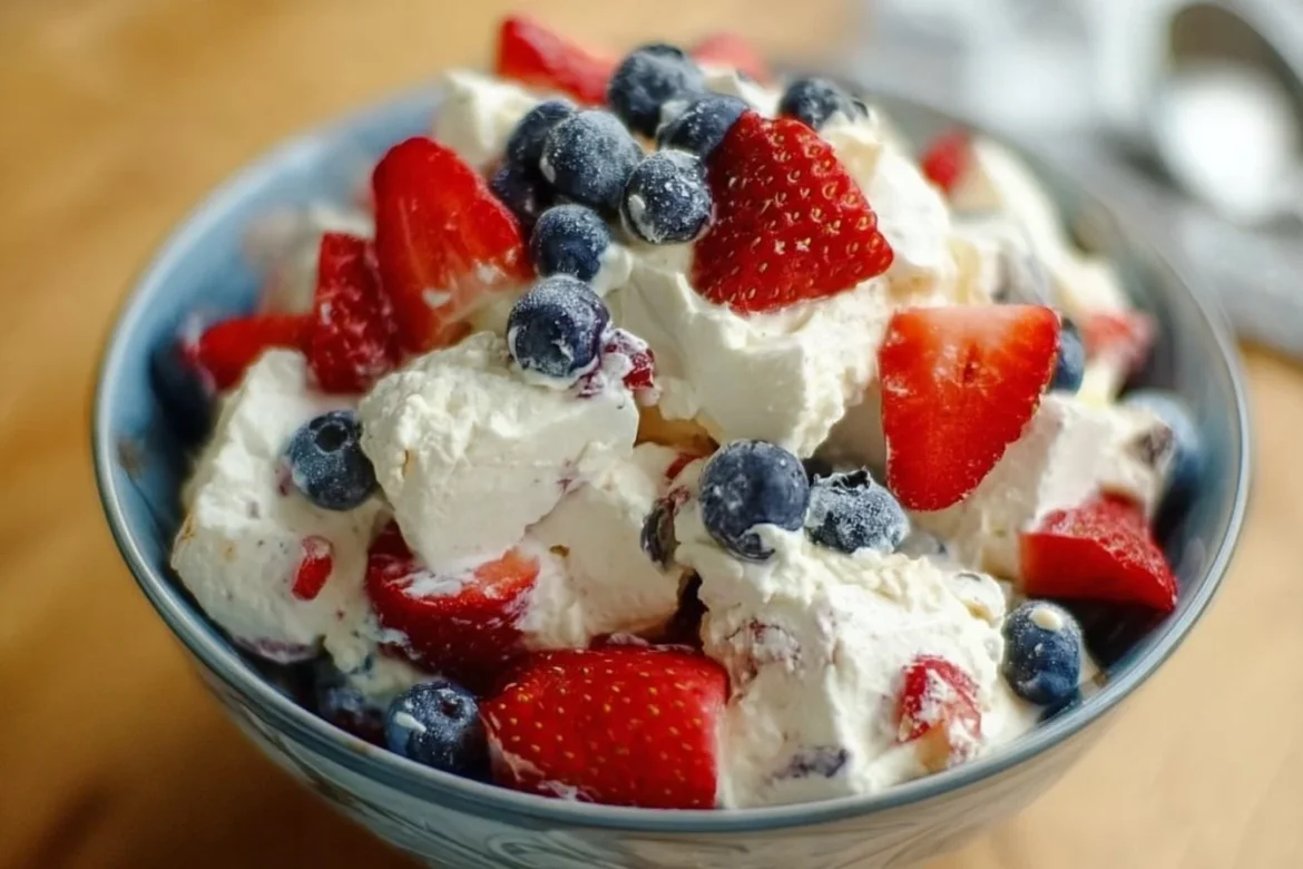 Red White and Blue Cheesecake Salad with strawberries, blueberries, and cream cheese