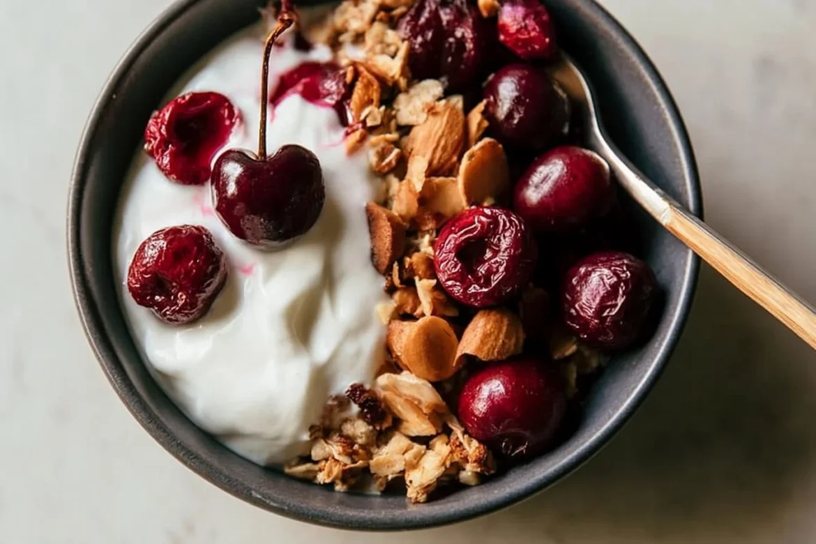 Roasted Cherry Yogurt Bowl with fresh cherries and creamy yogurt