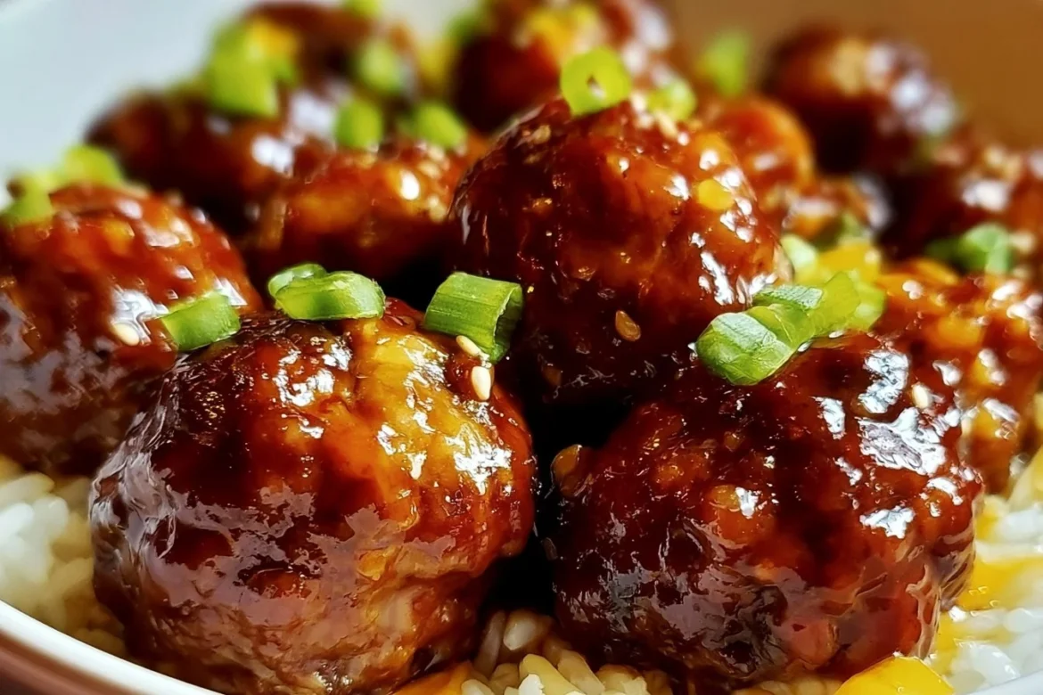 Delicious slow cooker teriyaki meatballs served in a bowl with garnishes.