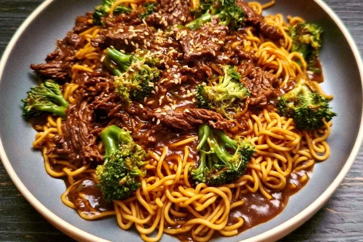 Plate of Mongolian beef and broccoli served with noodles