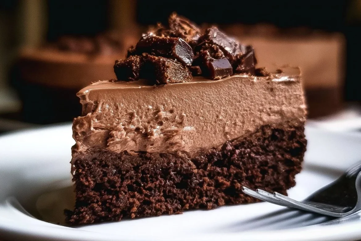 Delicious Brownie Mousse Cake, rich chocolate layers topped with creamy mousse.