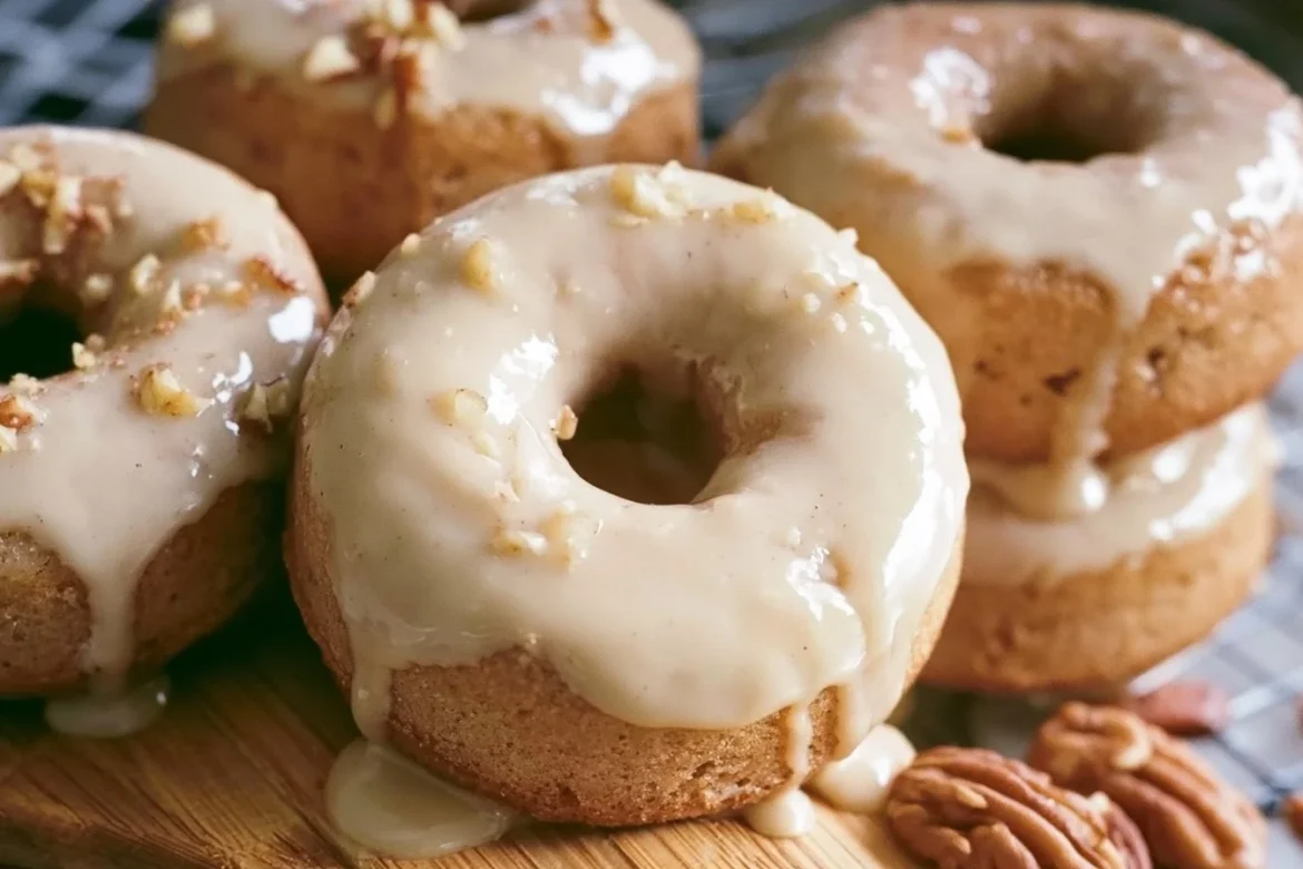Delicious spice cake donuts topped with a rich maple glaze