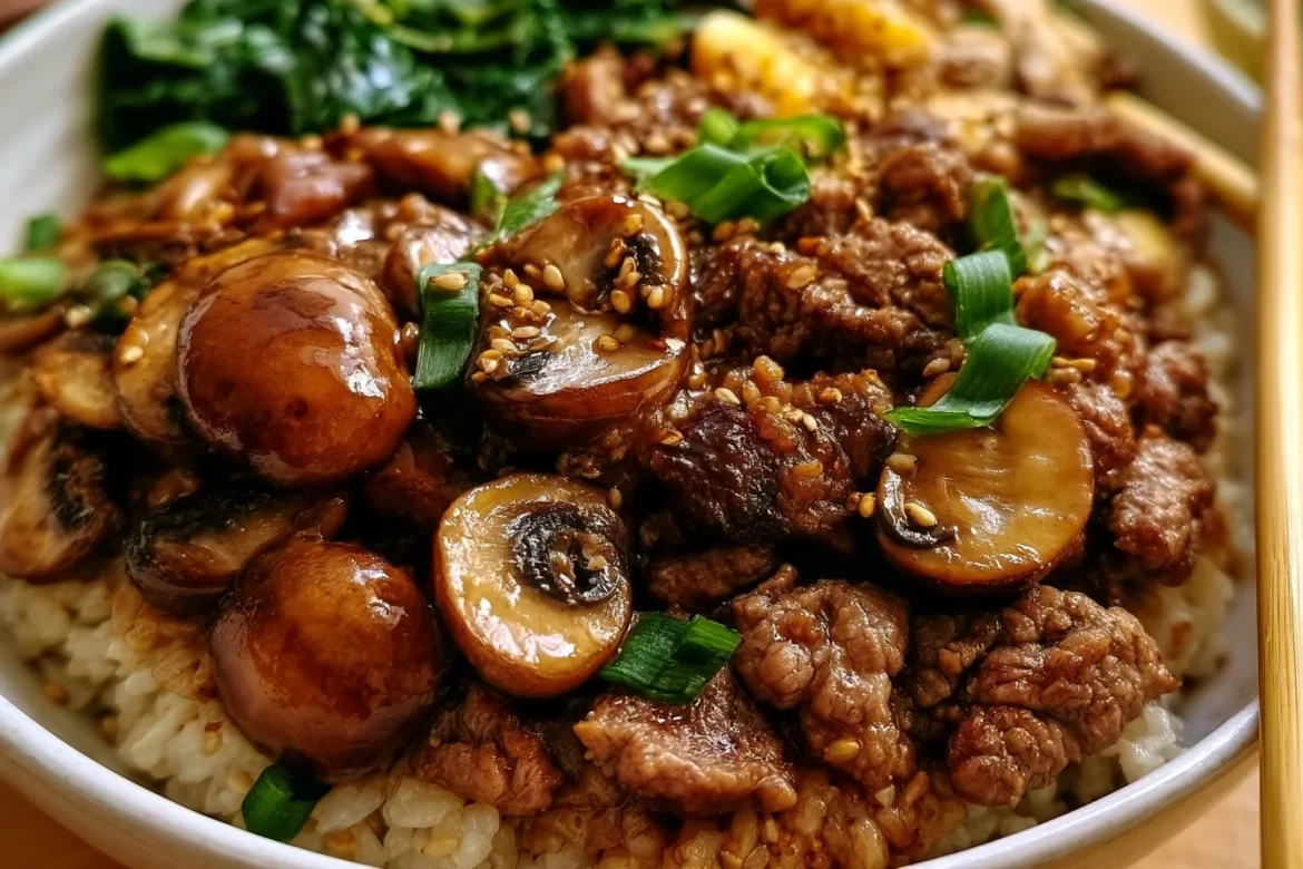 Beef and mushroom protein bowl topped with fresh herbs and vegetables