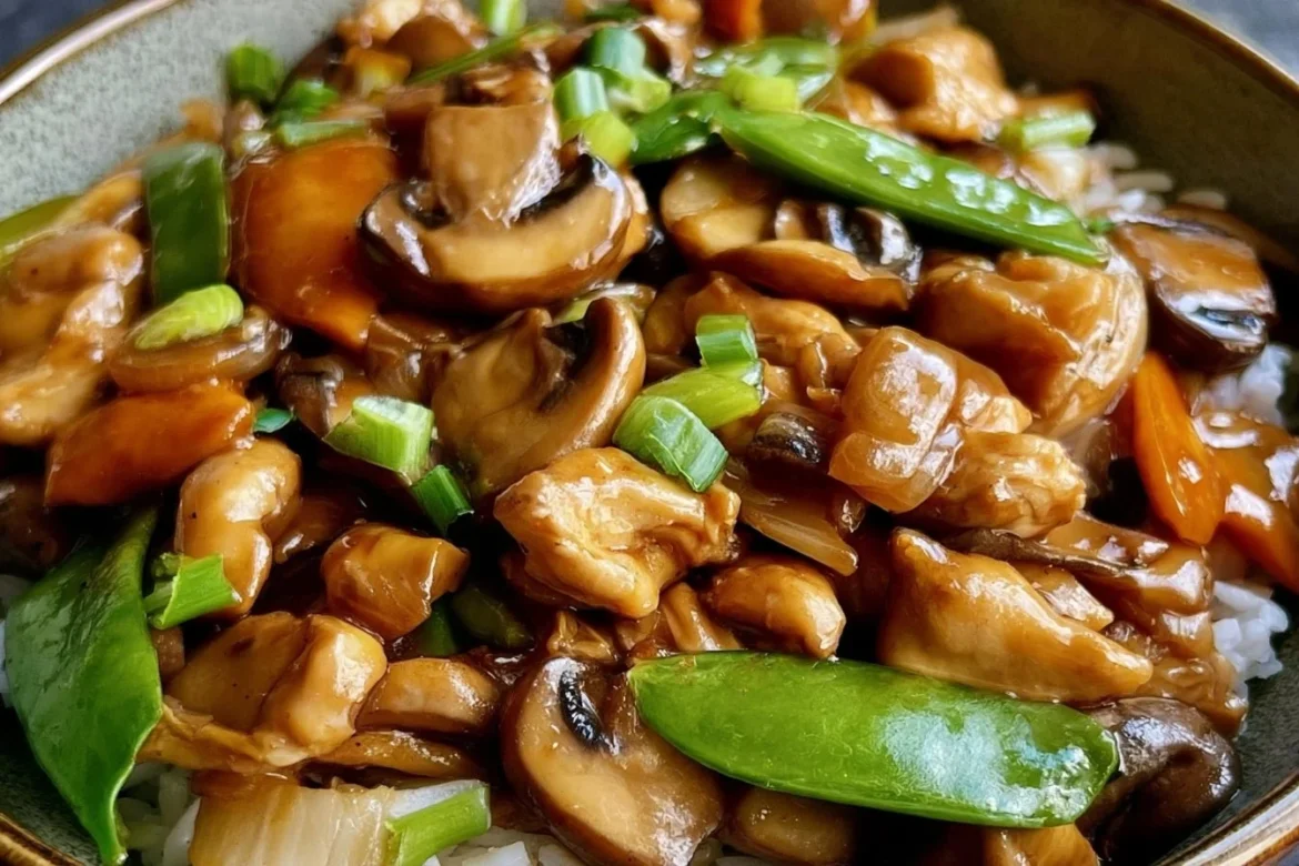 Plate of classic Moo Goo Gai Pan with chicken, mushrooms, and vegetables