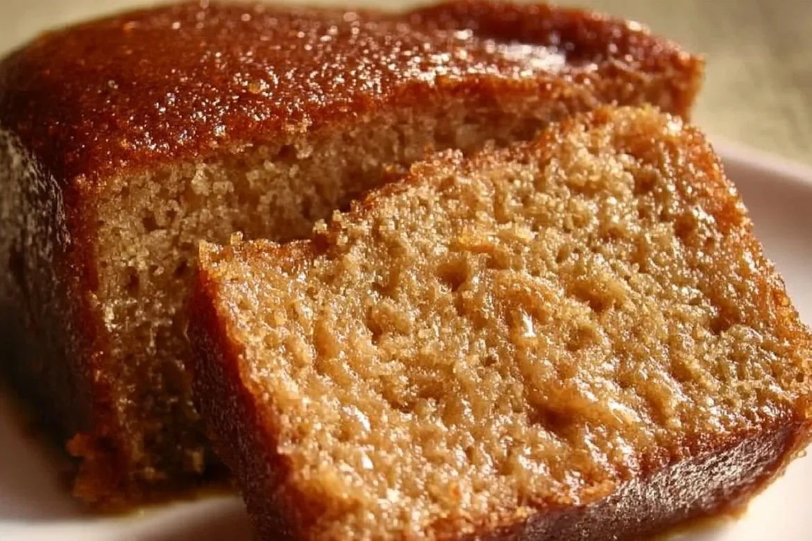 Delicious Honey Applesauce Cake topped with fresh apples and honey glaze