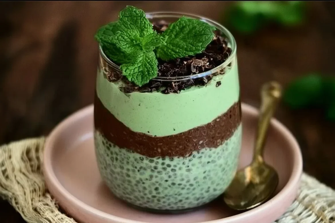 Mint Chocolate Chia Pudding topped with mint leaves and chocolate chips