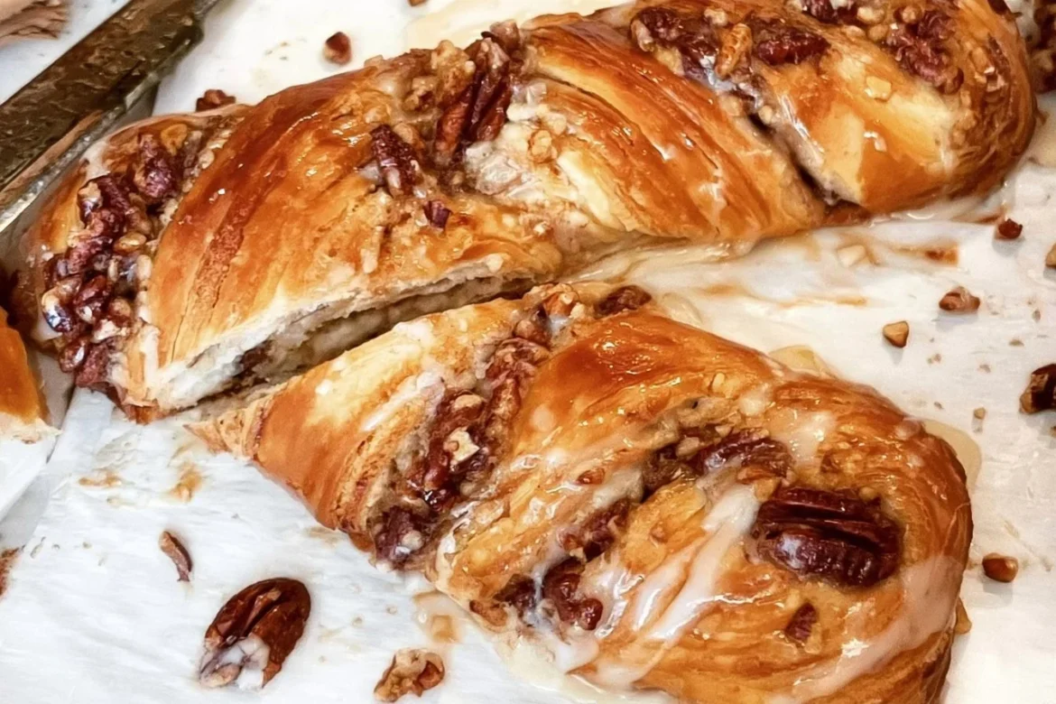 Delicious pecan pastry braid, a flaky dessert filled with nuts and sweetness.